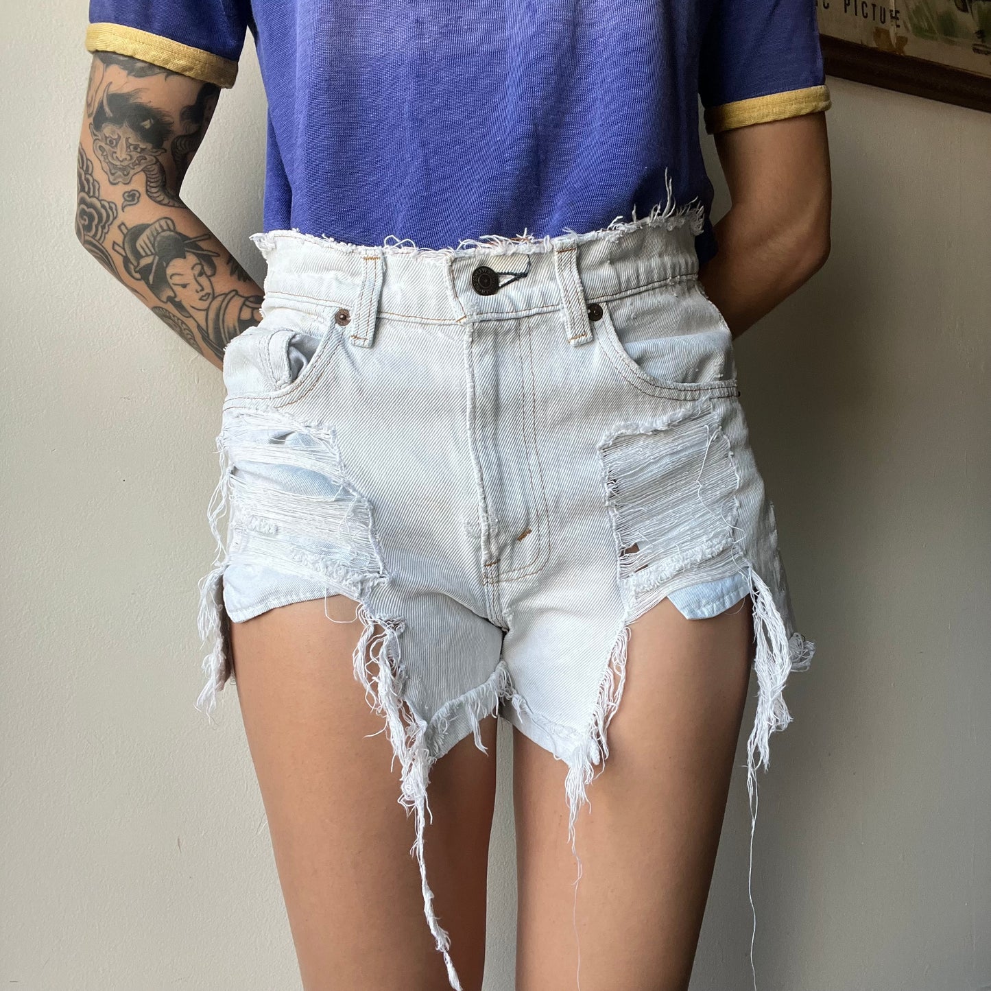 Vtg. Lightwash Thrashed Levi Shorts 30"W (women's 4)