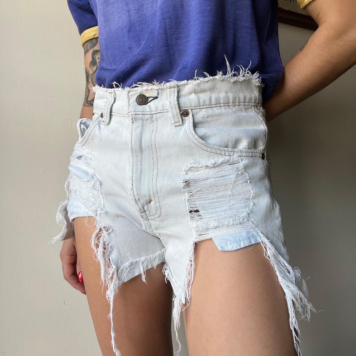 Vtg. Lightwash Thrashed Levi Shorts 30"W (women's 4)