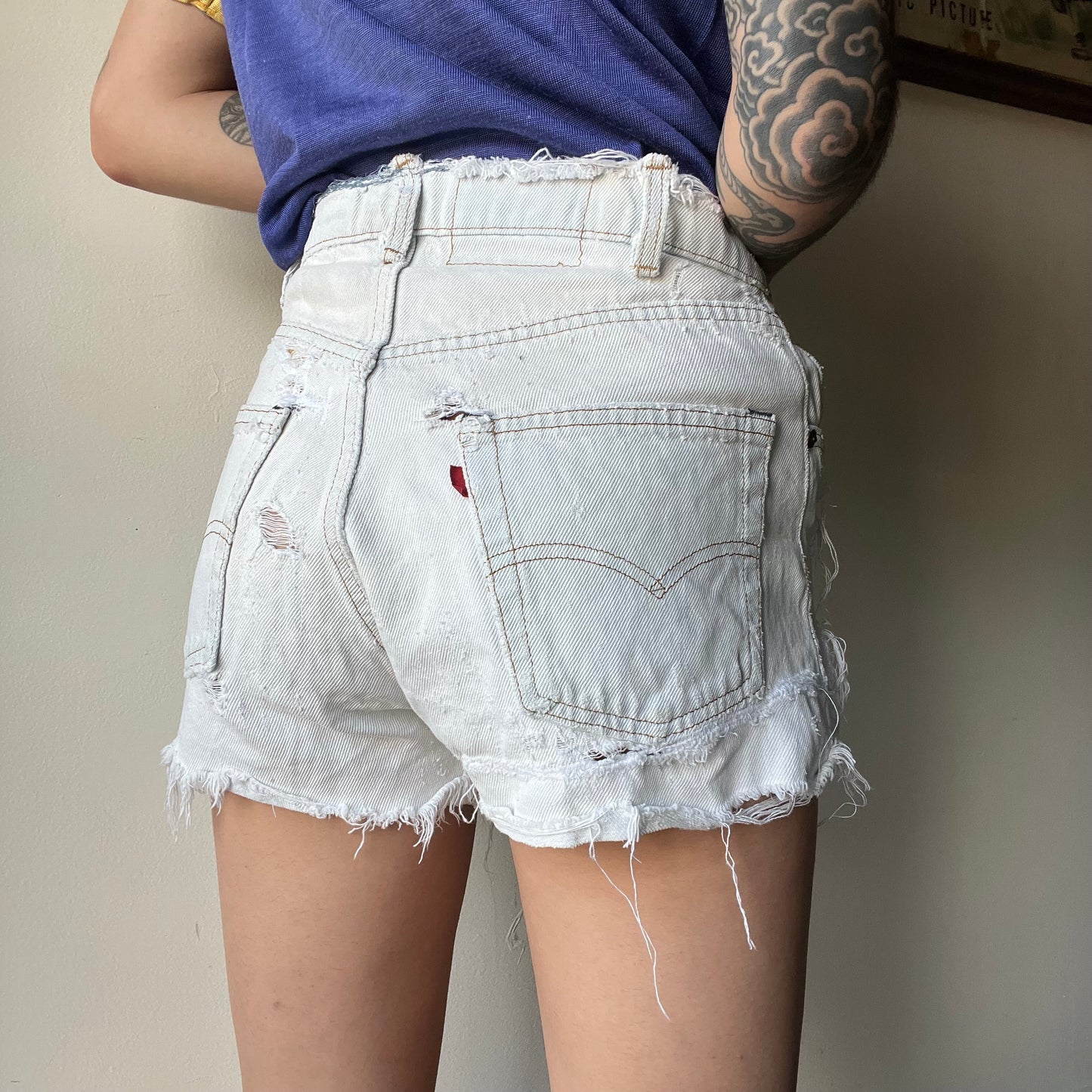 Vtg. Lightwash Thrashed Levi Shorts 30"W (women's 4)