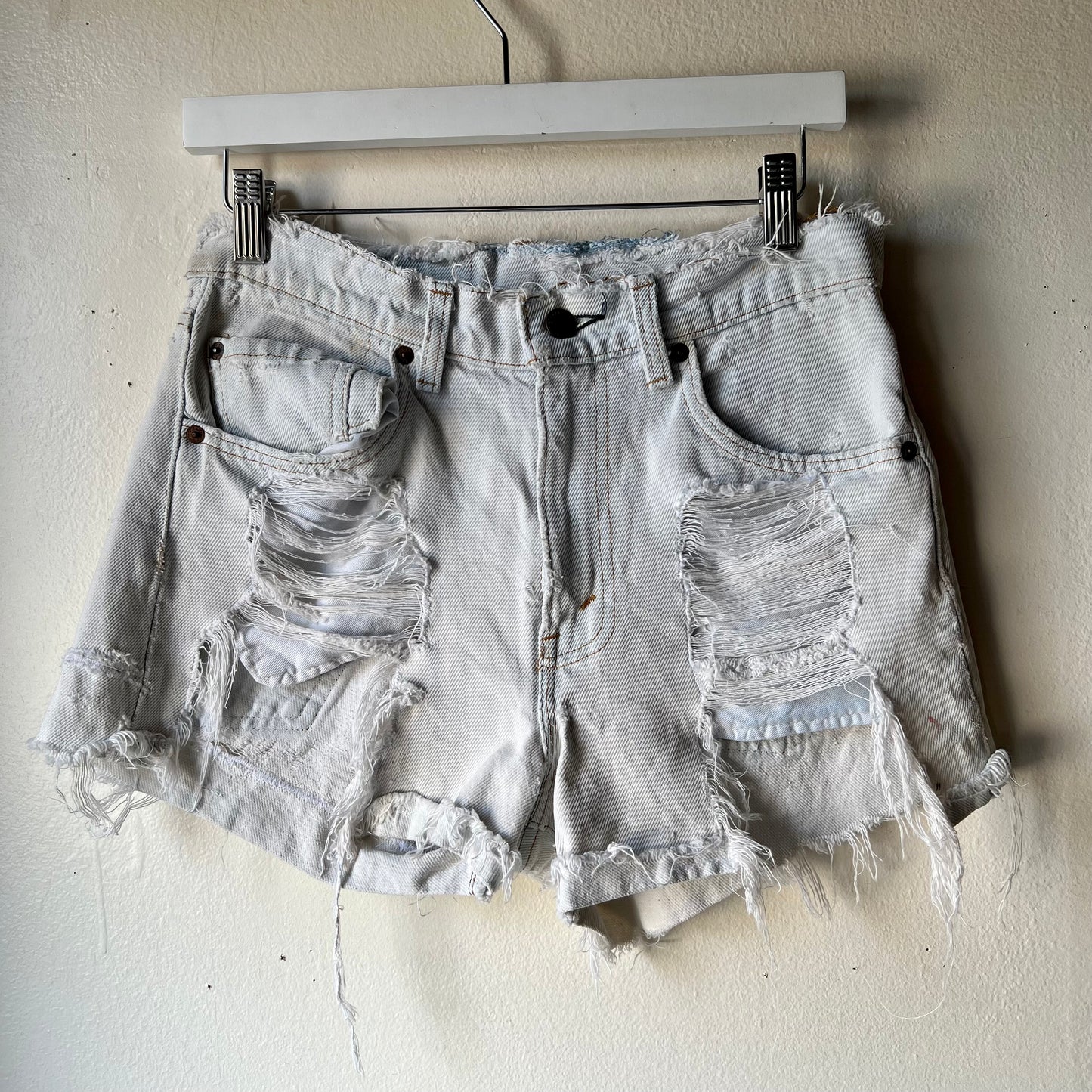 Vtg. Lightwash Thrashed Levi Shorts 30"W (women's 4)