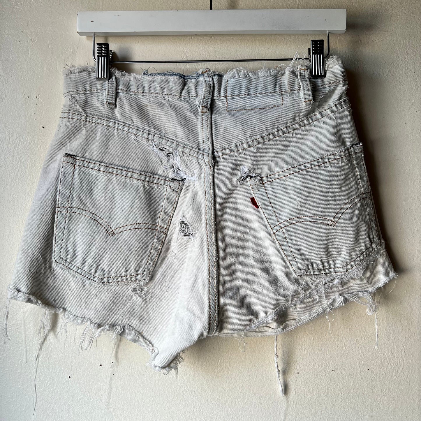 Vtg. Lightwash Thrashed Levi Shorts 30"W (women's 4)